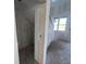 Hallway under construction with access to the upper floors at 2980 Embark Trail, St Cloud, FL 34771