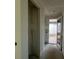 Hallway with natural light flowing through the space, ready for customization at 2980 Embark Trail, St Cloud, FL 34771