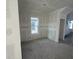 Living room under construction featuring a large window that offers great natural lighting at 2980 Embark Trail, St Cloud, FL 34771