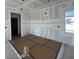 Spacious room featuring newly installed drywall and protected flooring, ready for customization at 2980 Embark Trail, St Cloud, FL 34771