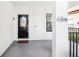 Welcoming entryway with decorative glass front door, sidelight and a 'Welcome' wall hanging at 332 Summer Place Loop, Clermont, FL 34714