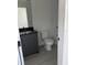 Modern bathroom with stylish vanity, toilet, tub and sleek fixtures at 3432 Tranquil Trl, Kissimmee, FL 34747
