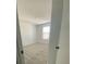Bright bedroom featuring neutral carpet and a window with natural light at 3432 Tranquil Trl, Kissimmee, FL 34747
