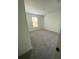 Bedroom with light gray carpet and natural light from the window at 3432 Tranquil Trl, Kissimmee, FL 34747