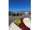 Community entrance with eye-catching floral displays and elegant signage at 3432 Tranquil Trl, Kissimmee, FL 34747