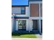Modern two-story home featuring a contemporary design and neutral color palette at 3432 Tranquil Trl, Kissimmee, FL 34747