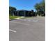 Exterior view showcasing the community's well-maintained parking area at 3432 Tranquil Trl, Kissimmee, FL 34747