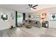 Bright living room features a large window, comfortable seating, and stylish decor at 3631 Surrey Dr, Orlando, FL 32812