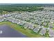 Aerial view of the neighborhood, showing the home's location with pond and green space views at 3970 Clipstone Pl, Sanford, FL 32773
