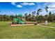 Community playground provides a safe, fun place for children to play, conveniently located on manicured grass at 3970 Clipstone Pl, Sanford, FL 32773