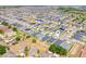 Aerial view of a residential neighborhood with a mix of single-Gathering homes and green spaces at 4231 Swan St, Haines City, FL 33844