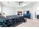 Spacious primary bedroom featuring a tray ceiling and ensuite bath at 4231 Swan St, Haines City, FL 33844