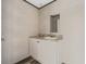 Bathroom featuring modern vanity with granite countertops at 4425 Mobilaire Dr, Orlando, FL 32822
