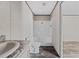 Bathroom featuring new fixtures, a modern shower and a granite sink at 4425 Mobilaire Dr, Orlando, FL 32822