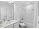 Bright bathroom featuring a single sink and a shower over tub with a curtain at 4517 Old Carriage Trail, Oviedo, FL 32765