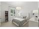This bedroom features a large window with lots of natural light, and built-in bookcases at 4517 Old Carriage Trail, Oviedo, FL 32765
