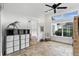 Bonus room with storage, bright lighting, stone floors, and access to the backyard at 4517 Old Carriage Trail, Oviedo, FL 32765