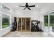 Exercise room with workout machines, sauna, and access to the patio at 4517 Old Carriage Trail, Oviedo, FL 32765