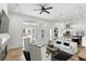 Spacious living room with large windows and access to the backyard at 4517 Old Carriage Trail, Oviedo, FL 32765