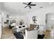 Open living room adjacent to the kitchen with modern decor at 4517 Old Carriage Trail, Oviedo, FL 32765