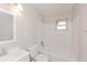 Bright bathroom features subway tile surround, a toilet, and a sink at 510 Brighton Way, Casselberry, FL 32707