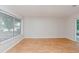 Bright living room featuring wood floors and large windows at 510 Brighton Way, Casselberry, FL 32707