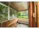 This sunroom with views of the trees could be converted to a relaxing space at 510 Brighton Way, Casselberry, FL 32707