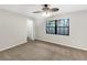 Bedroom with plush carpet, neutral paint, and a cozy ambiance at 5212 Waterwood Run, Bartow, FL 33830