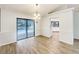 Elegant dining area featuring hardwood floors and access to the pool area at 5212 Waterwood Run, Bartow, FL 33830
