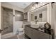 Modern bathroom featuring a glass walk-in shower, vanity, and updated fixtures at 5301 Forest Breeze Ct, St Cloud, FL 34771