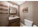 Bathroom featuring wood accents and rustic lighting at 5301 Forest Breeze Ct, St Cloud, FL 34771