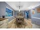 Inviting dining room featuring natural light and space for entertaining at 5301 Forest Breeze Ct, St Cloud, FL 34771