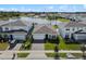Beautiful one-story home featuring a well-manicured lawn, attractive landscaping, and a 2-car garage at 5648 Cedar Chase Dr, St Cloud, FL 34771
