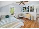 Well-decorated bedroom with unique decor and a cozy atmosphere, perfect for relaxation and personal expression at 609 W Osceola St, Clermont, FL 34711