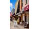 Charming downtown street view with shops featuring unique awnings and decor at 609 W Osceola St, Clermont, FL 34711
