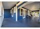 Spacious, covered front porch with rocking chairs and a grill, ideal for outdoor relaxation and entertainment at 609 W Osceola St, Clermont, FL 34711
