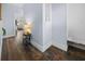 Bright hallway with hardwood floors, bench seating, and a decorative wall niche at 609 W Osceola St, Clermont, FL 34711