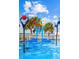 Fun splash pad featuring colorful water features and a CCCM sign on a sunny day at 609 W Osceola St, Clermont, FL 34711