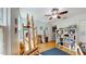 Bright bedroom with hardwood floors and a ceiling fan, perfect for a home art studio at 6152 Meriwether, Winter Garden, FL 34787