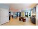 Open concept dining area with view of kitchen, pendant lighting and seating for six at 6152 Meriwether, Winter Garden, FL 34787