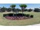 Beautiful landscaping with colorful flowerbeds accents the community grounds at 6152 Meriwether, Winter Garden, FL 34787