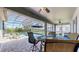 Large patio with seating areas and screened-in pool offers ample outdoor space at 6152 Meriwether, Winter Garden, FL 34787
