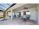 Relaxing outdoor patio with ceiling fans and access to the screened-in pool at 6152 Meriwether, Winter Garden, FL 34787