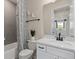 Bright bathroom with a vanity and tiled shower at 6324 Dew Drop Loop, St Cloud, FL 34771