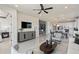 Spacious living room showcasing an open layout with modern accents and ample natural light at 6324 Dew Drop Loop, St Cloud, FL 34771