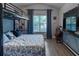 Bright bedroom features a bunkbed, a sleek desk, and minimalist decor creating an inviting atmosphere at 6874 Sperone St, Orlando, FL 32819