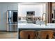 Updated kitchen featuring stainless steel appliances and a view of the breakfast bar at 6874 Sperone St, Orlando, FL 32819