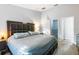 Luxurious main bedroom features a large bed and modern furniture at 6874 Sperone St, Orlando, FL 32819