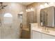 Bathroom tiled shower with glass doors and a built-in bench at 8368 Rambling River Dr, Sanford, FL 32771