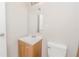 Small bathroom featuring a single vanity, mirror, and toilet at 855 Third St, Orange City, FL 32763